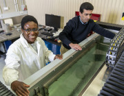 Dr Chirima (left) and fellow researcher Dr Matthew Ibrahim with DSTG’s ultrasonic immersion system which is able to measure the speed of sound, transmission loss and reflection coefficients of Dr Chirima’s material samples which are immersed in the water.