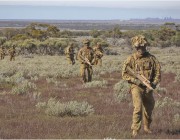 Members from the 1st Brigade, Australian Army, on patrol during Exercise Boars Run at Cultana Training Area. 